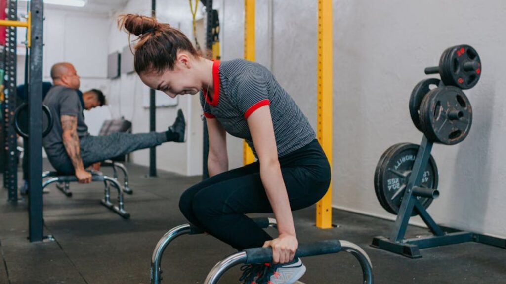 People exercising in a fitness studio run with WellnessLiving's software.