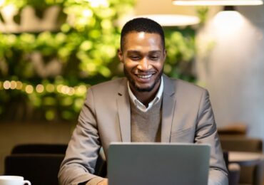 Someone opening an email promotion from their favorite small business.