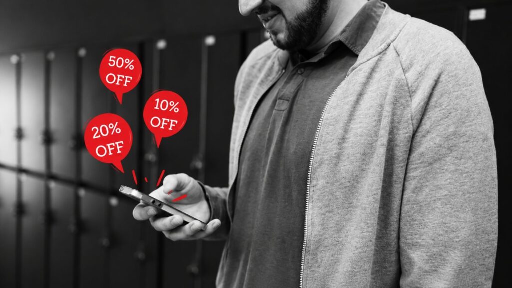 A man receiving a discount code from one of his favorite small businesses.
