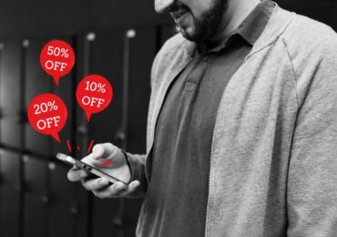 A man receiving a discount code from one of his favorite small businesses.