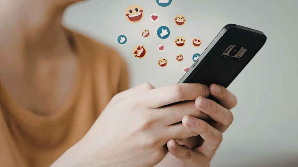 A wellness studio owner, using social media on her phone.