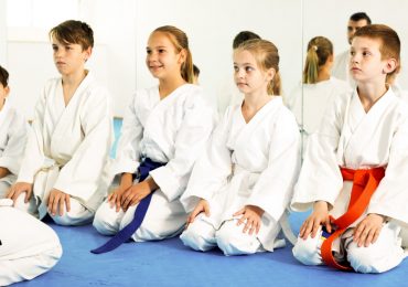 martial arts profitable, students listening to instructor
