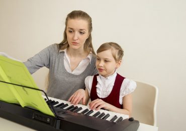 make-up lessons, piano teacher and student