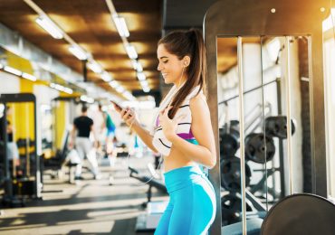 client app, staff app, girl with phone at gym