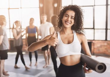 yoga studio branding, Happy yogi ready for class