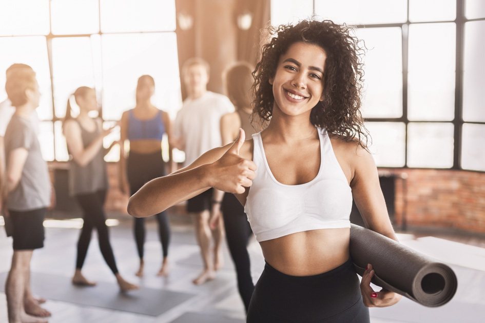 yoga studio branding, Happy yogi ready for class