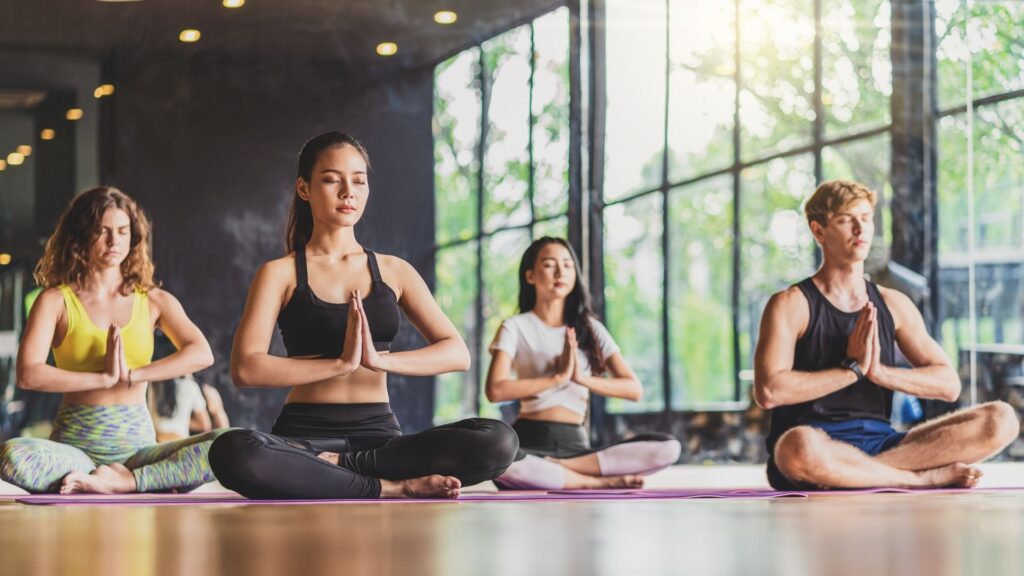A popular yoga studio, hosting a New Year's meditation class.