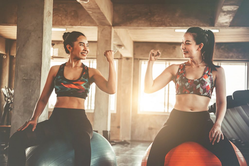 new year's resolution gym, two women at the gym