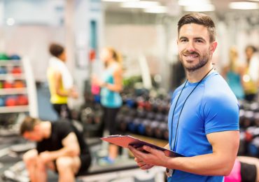 how to upsell gym memberships, trainer in gym