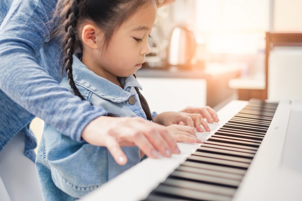 music school management system, girl playing piano