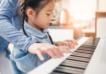 music school management system, girl playing piano