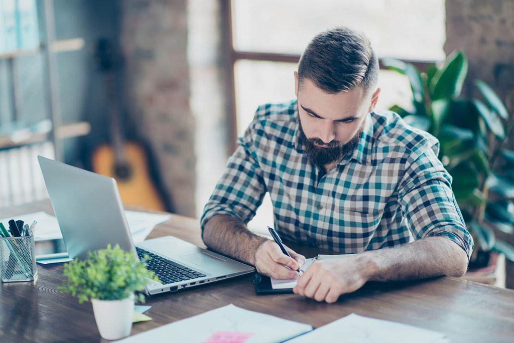 market your business, man working with computer