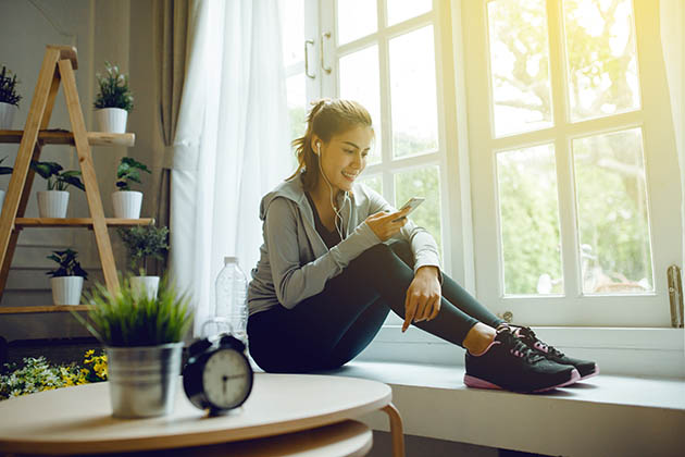 managing capacity, fitness girl with phone