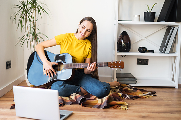 music school, woman teaches music lesson