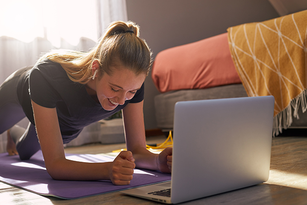 on-demand classes, woman taking class