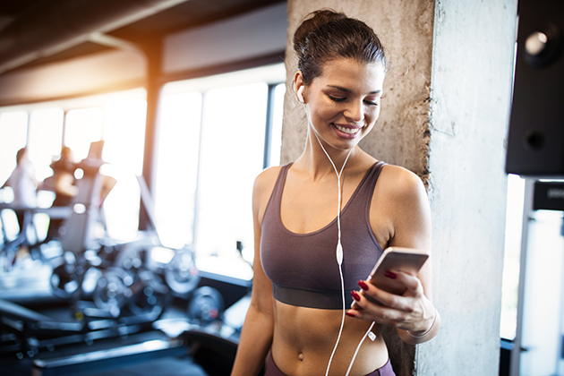 online store, sporty woman using her phone