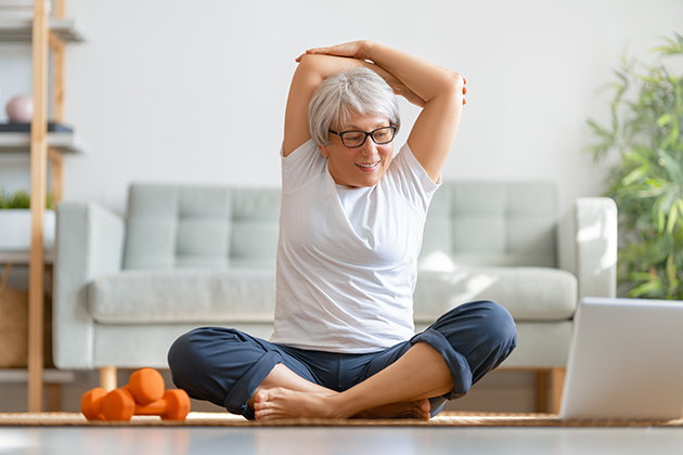 fitness studio, senior woman exercising at home