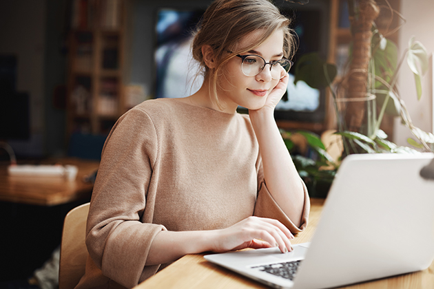 intro offers, woman looking her computer