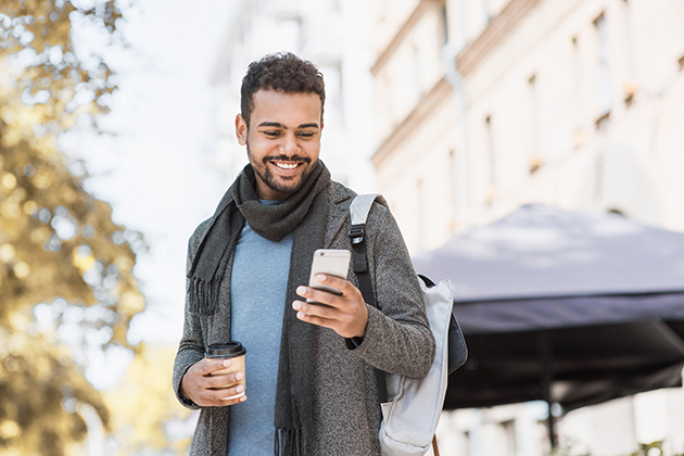 software tools, young man with a phone