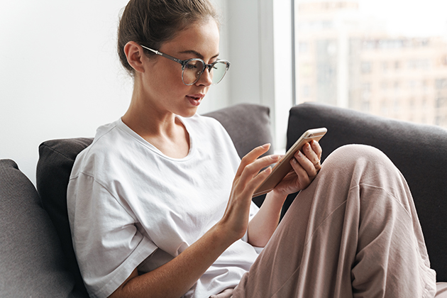 strategically plan, concentrated woman using cellphone