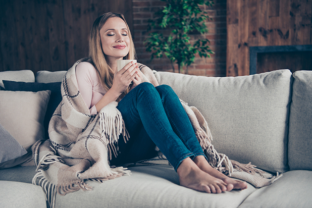 strategically plan, woman relaxing on a couch