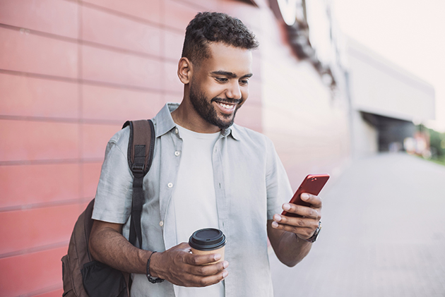 take your business virtual, young handsome man using smartphone