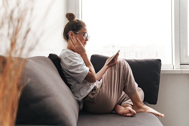 managing capacity with wait lists, concentrated woman using cellphone