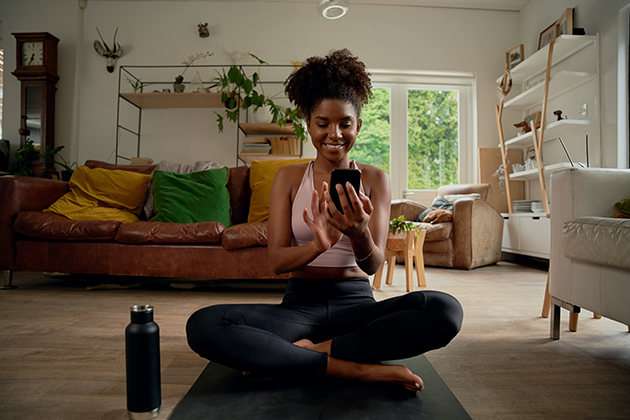 referral program, woman on her phone