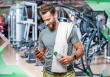 spam trigger words to avoid, man on phone in gym