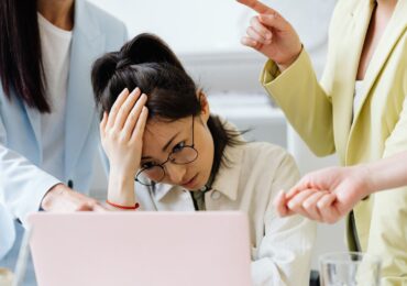 A yoga studio owner stressed about which software to choose.