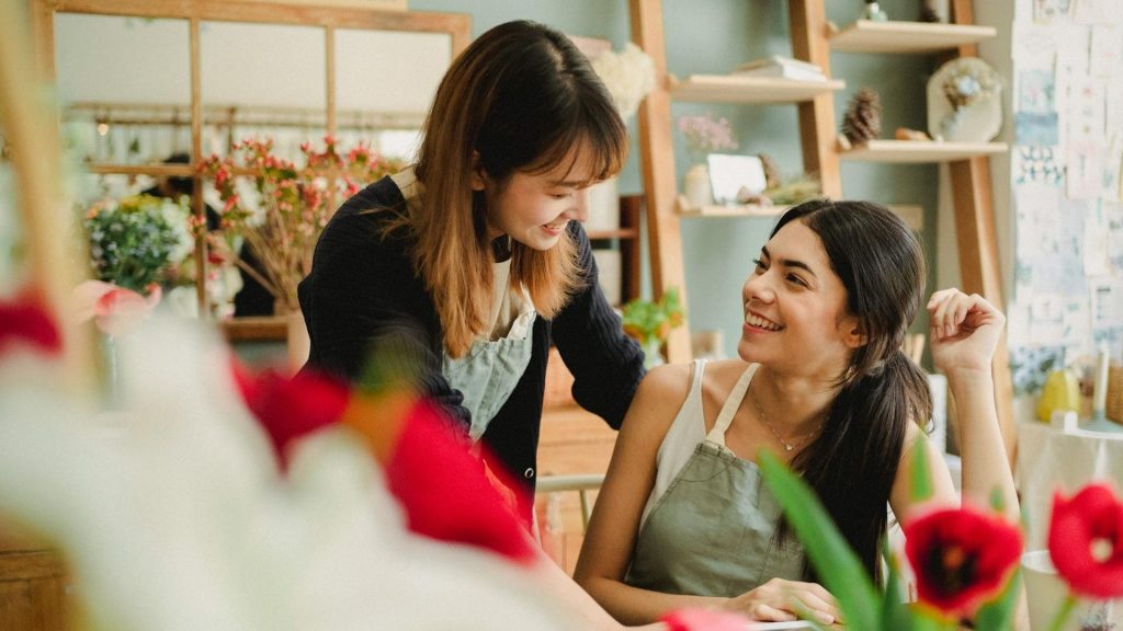 A small business owner talks excitedly about her new business management software.
