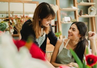 A small business owner talks excitedly about her new business management software.