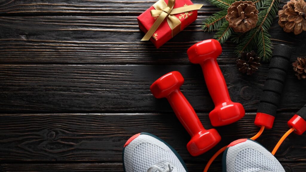A photo of a holiday present and some festive workout gear.