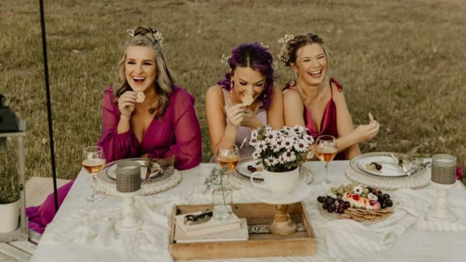 Glow Gals outdoors enjoying lunch