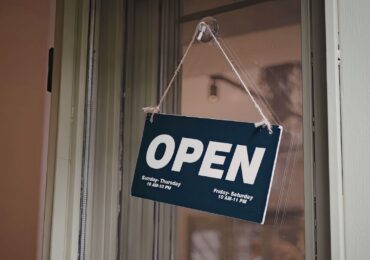 The door of a new franchise location, open for business.