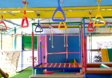 A colorful indoor playground and party space for kid's birthdays.
