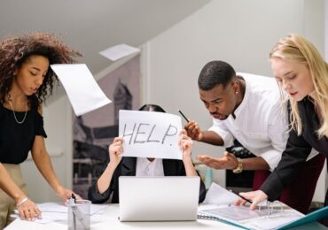 A small business owner, being torn between the needs of her staff and her clients.