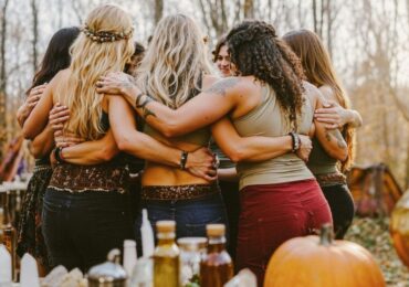 A group of women at Aura Wellness Collective during an autumn healing circle.