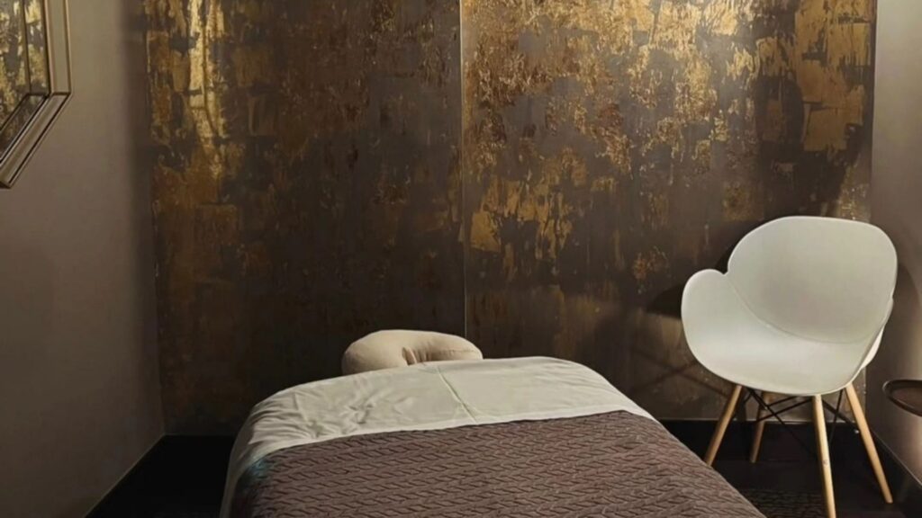 A beautiful massage room, laid out and ready for a client.