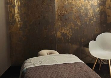 A beautiful massage room, laid out and ready for a client.