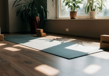 A mat laid out in a beautiful Pilates studio, run by WellnessLiving.