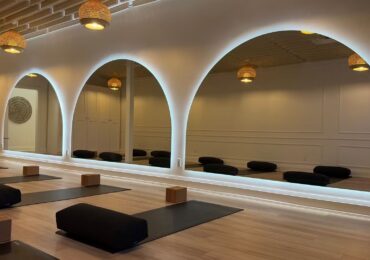 Inner Glow Studio's space with beautiful lighting and ready for a yoga class.