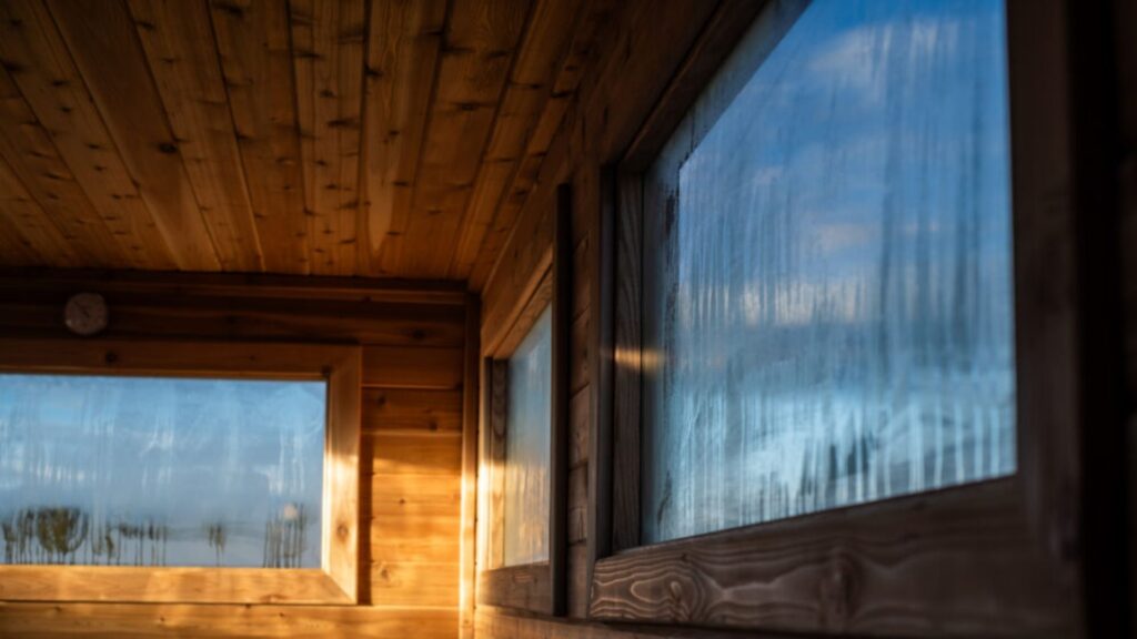 The steamed up windows inside Cedar Sauna House.