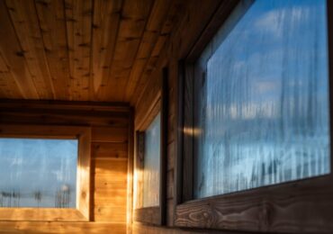 The steamed up windows inside Cedar Sauna House.
