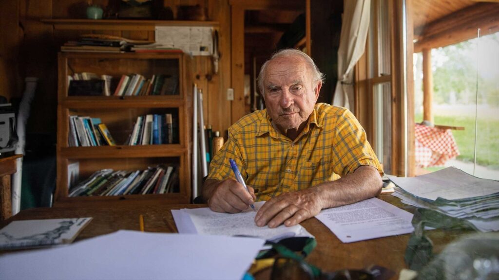The founder of Patagonia, writing at his desk.
