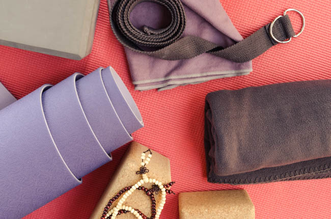 If you want to take it one step further, consider buying inventory with a color theme in mind. Yoga Studio Merchandising, yoga mat and props