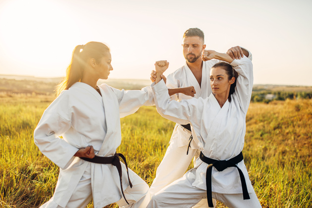 Marketing Martial Arts, couple and martial arts trainer