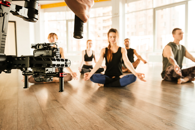 Yoga studio promotion, video shoot of yoga poses in a studio