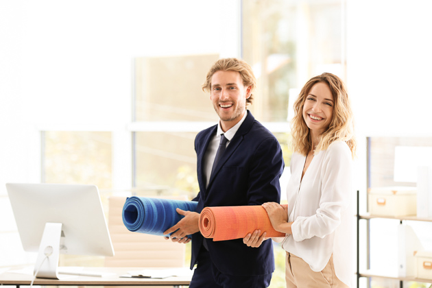 new year marketing strategy, corporate employees holding yoga mats