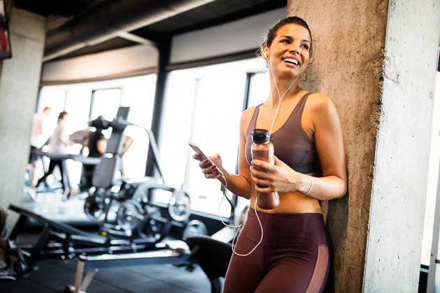 new years resolution gym, happy woman at the gym